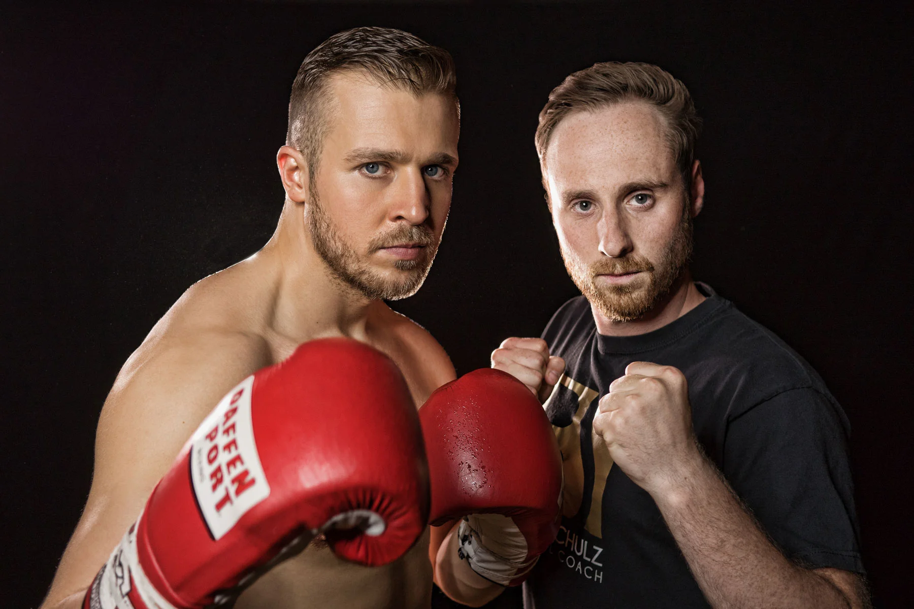 Professional boxing coach and boxer portrait retouching with detailed skin and glove contrast adjustments
