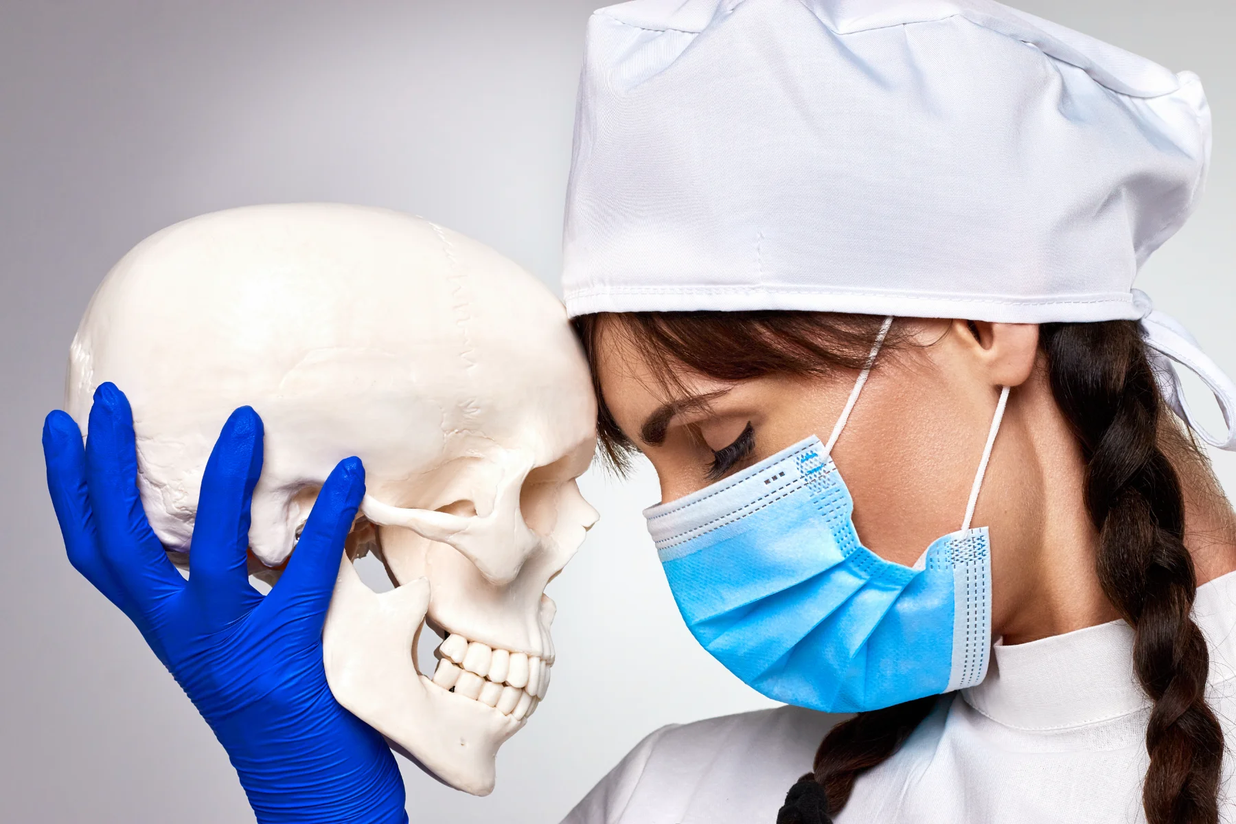 Przedpamiec book series commercial retouching – medical portrait holding skull