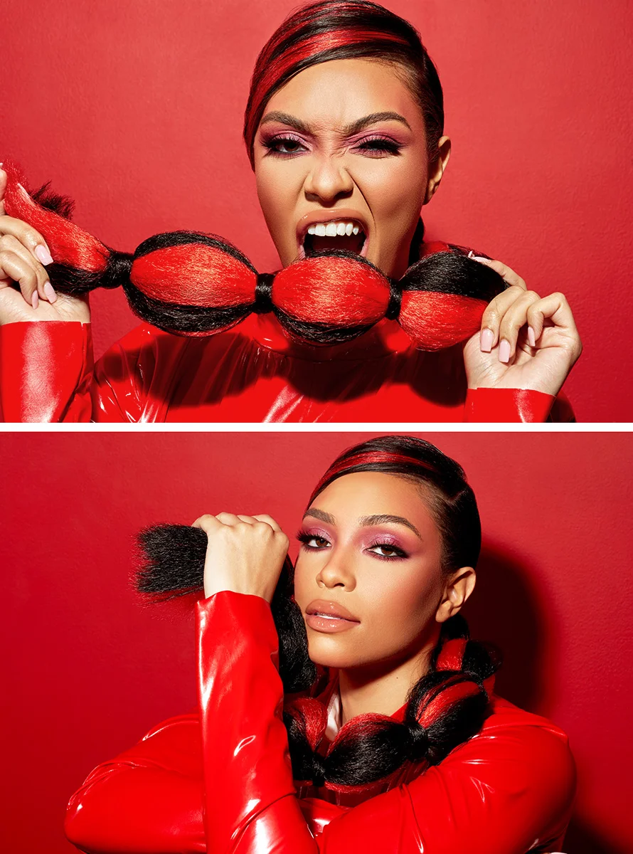 Creative fashion portrait retouching of a model wearing a red latex outfit with braided red and black hair
